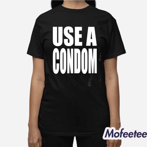 Rihanna’s USE A Condom Shirt